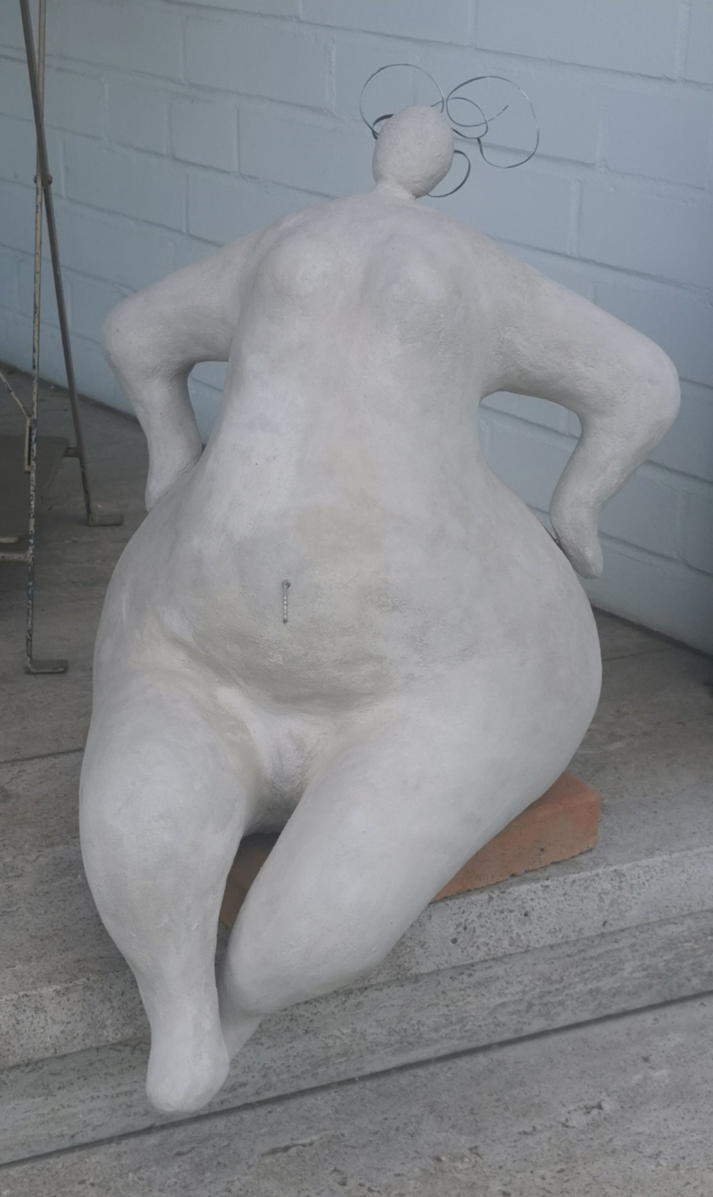 Frau Rubens sitzend