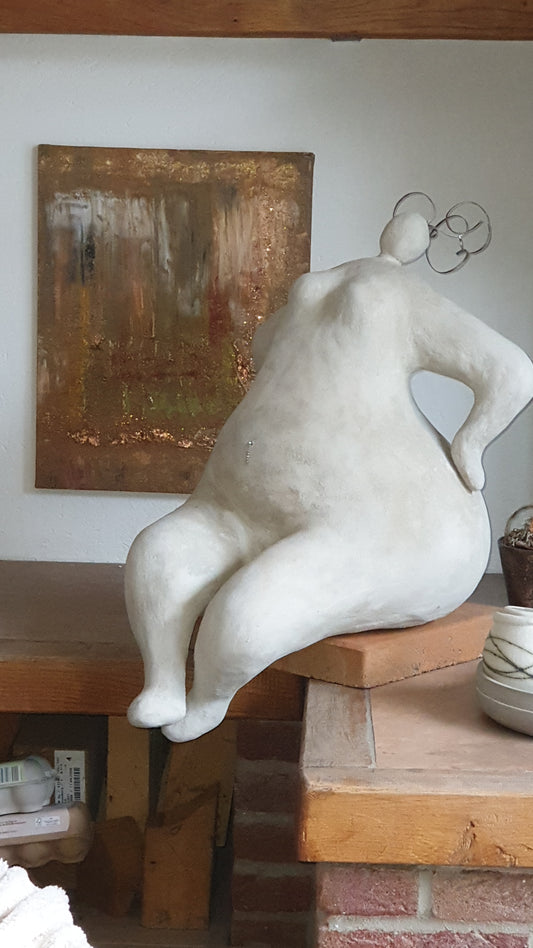 Frau Rubens sitzend